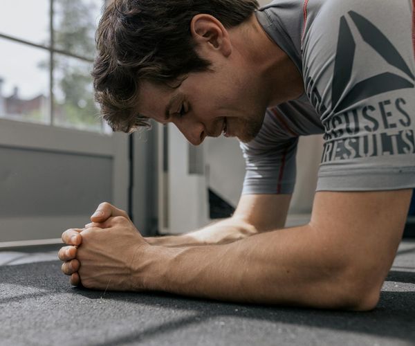 Man demonstrating stability and focus during physical training